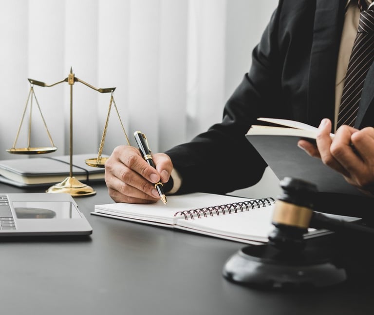 lawyer writing in notepad
