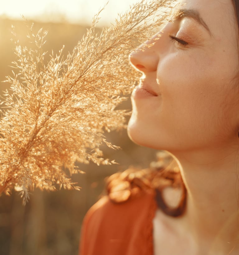 femme qui est apaisée qui respire et sourit, magnétiseur à Brains 44