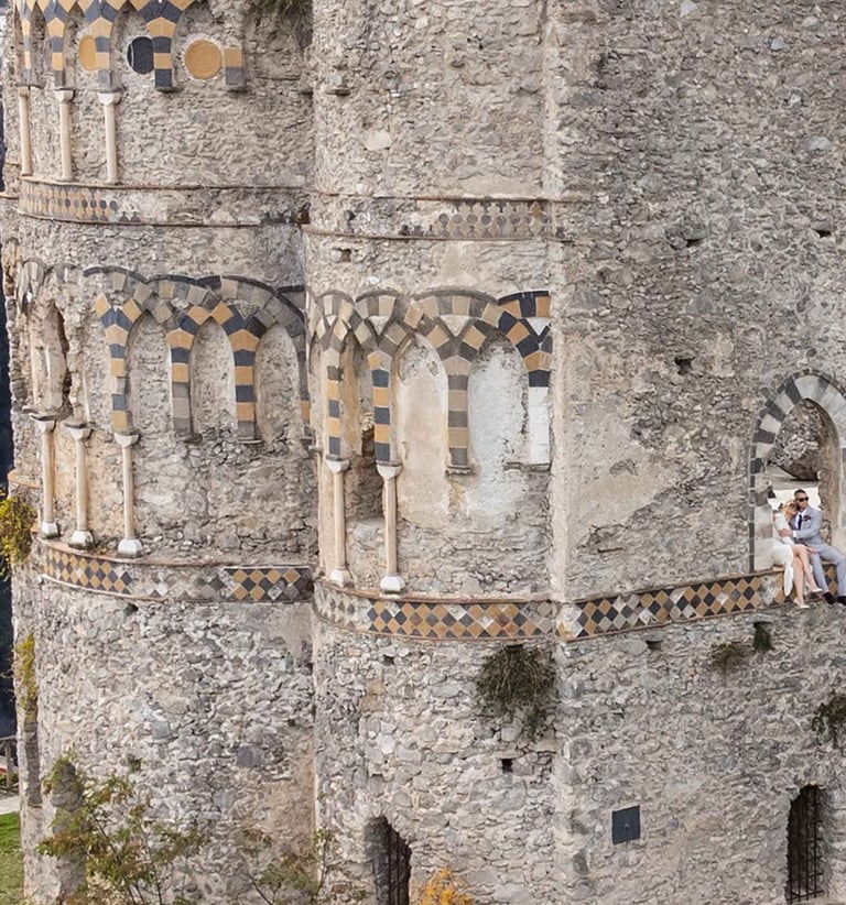 a castle like structure with a tower in the middle of the picture