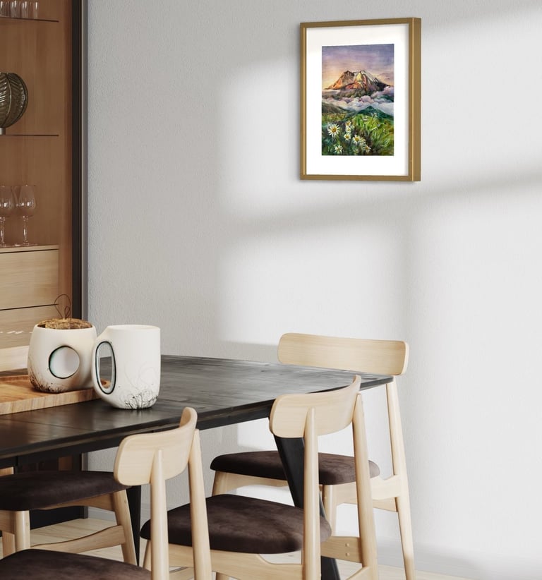 Angela Moiseieva original painting 'Sun-Kissed Peaks' above a dining table.