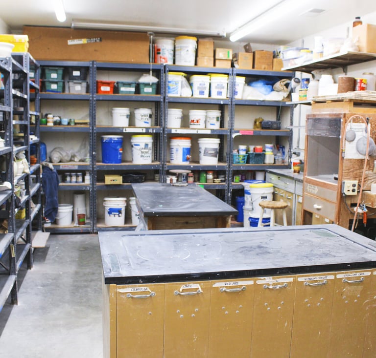 Image of our Moss Street studio glaze room which also houses many of our dry materials.