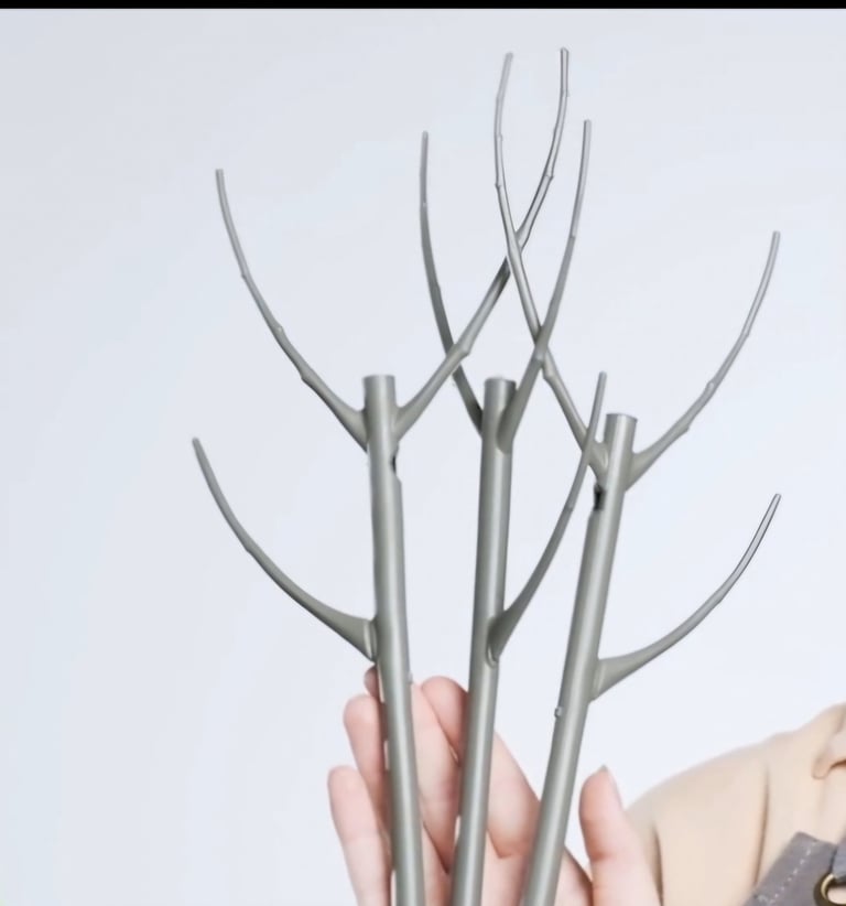 Branch-style plant support stakes used to stabilize indoor houseplant stems and encourage growth