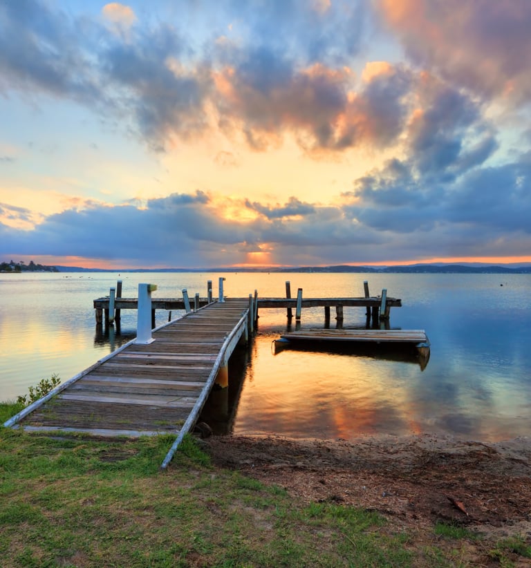 a dock with a dock and a boat in the water