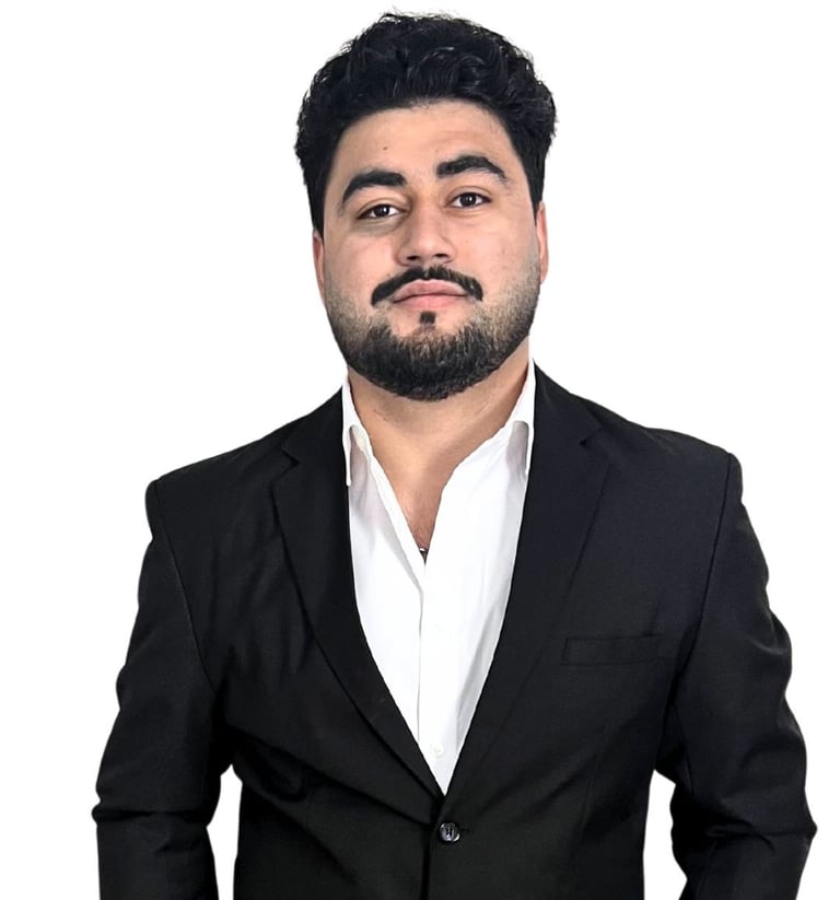 a man in a suit and white shirt