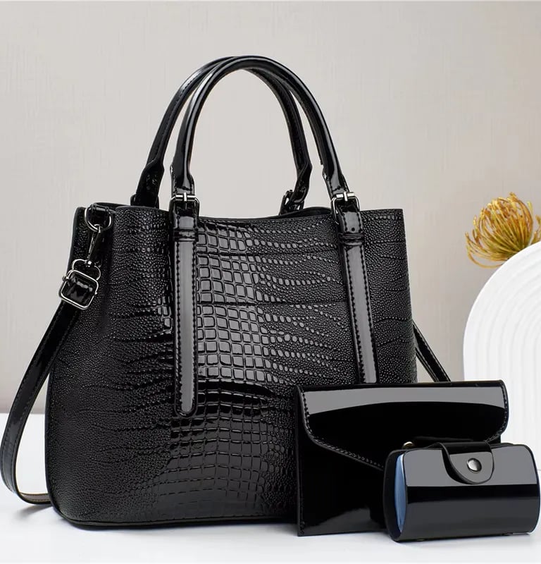a black purse with a wallet and a wallet
