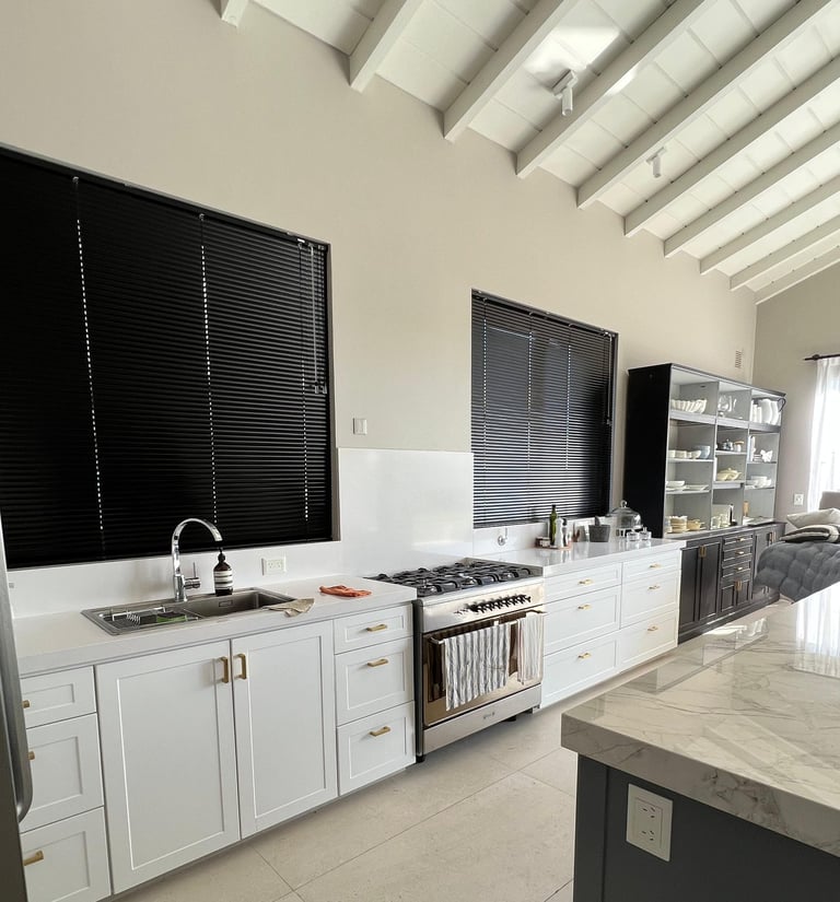a kitchen with a stove top oven and a stove top oven