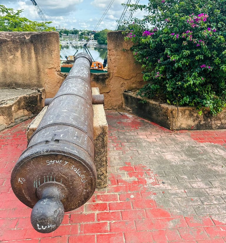 a cannon on a brick wall in a brick wall santo domingo punta cana