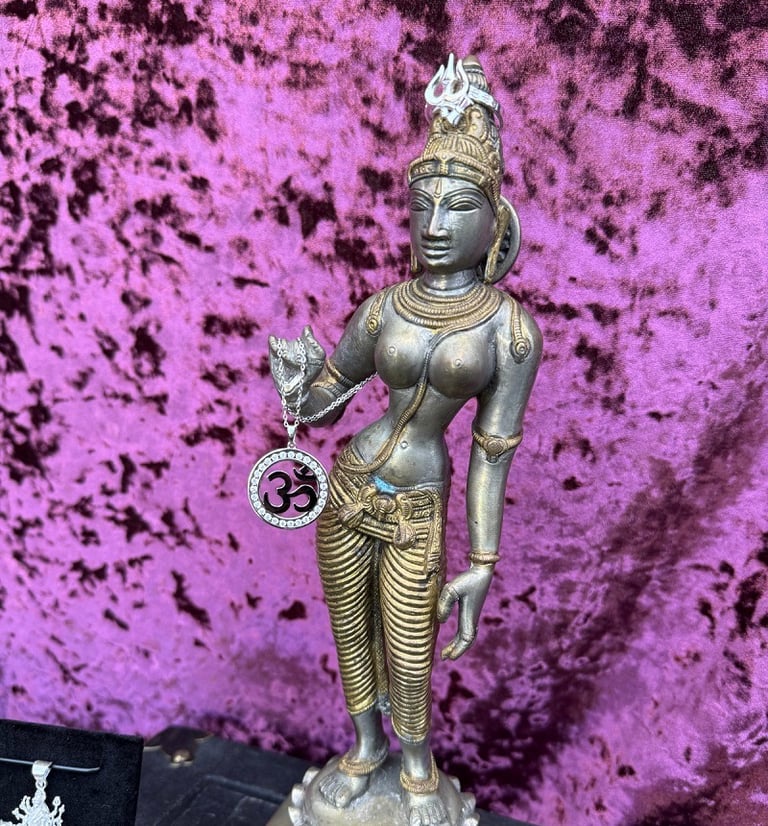 Parvati with Om Moisanite Pendant