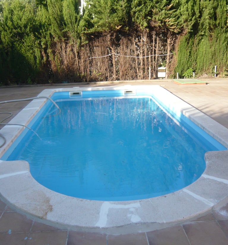 Piscina privada de la vivienda.