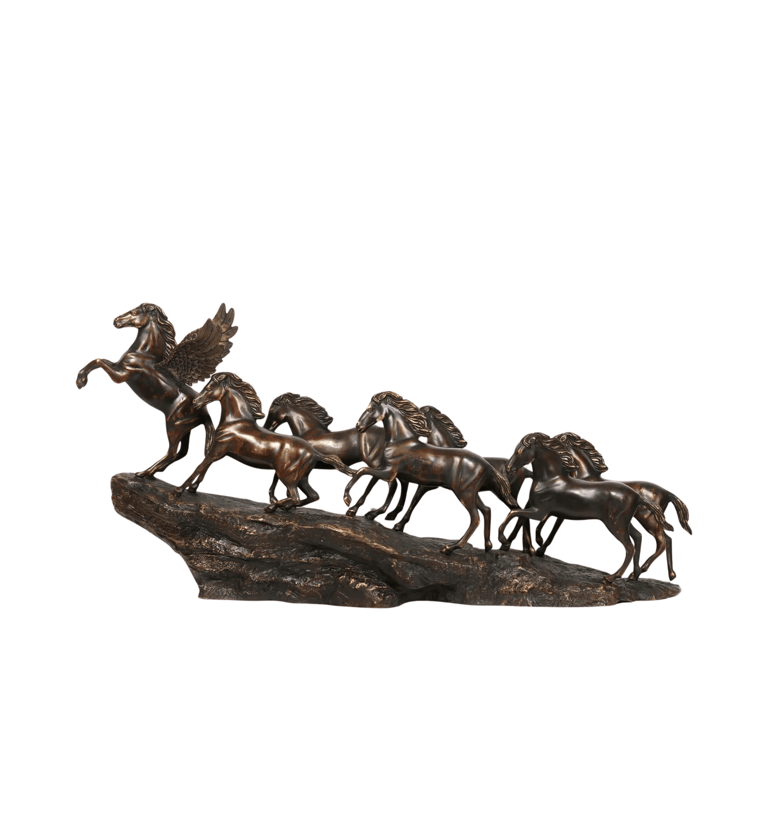 a statue of a man riding a horse drawn on a rock