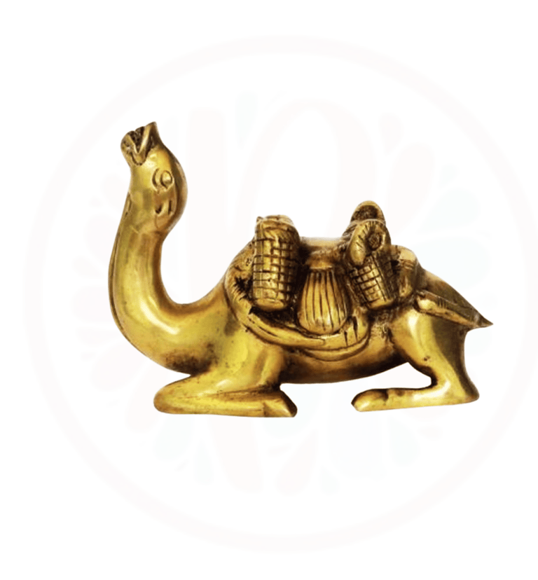 a gold colored camell with a camel in the middle of it