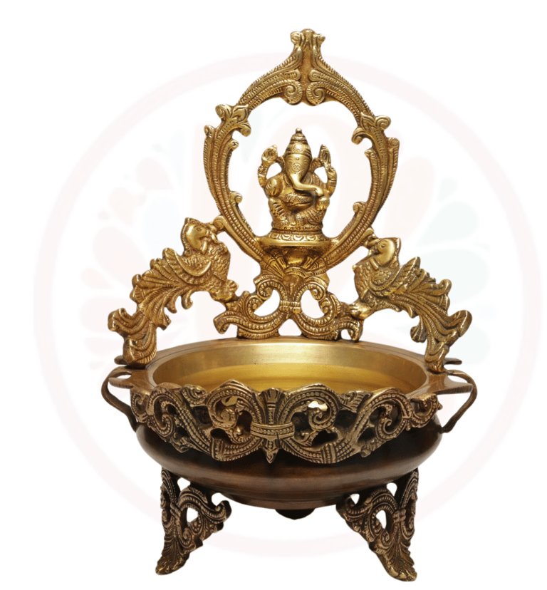 a gold plated bowl with a gan ganesh ganesh statue