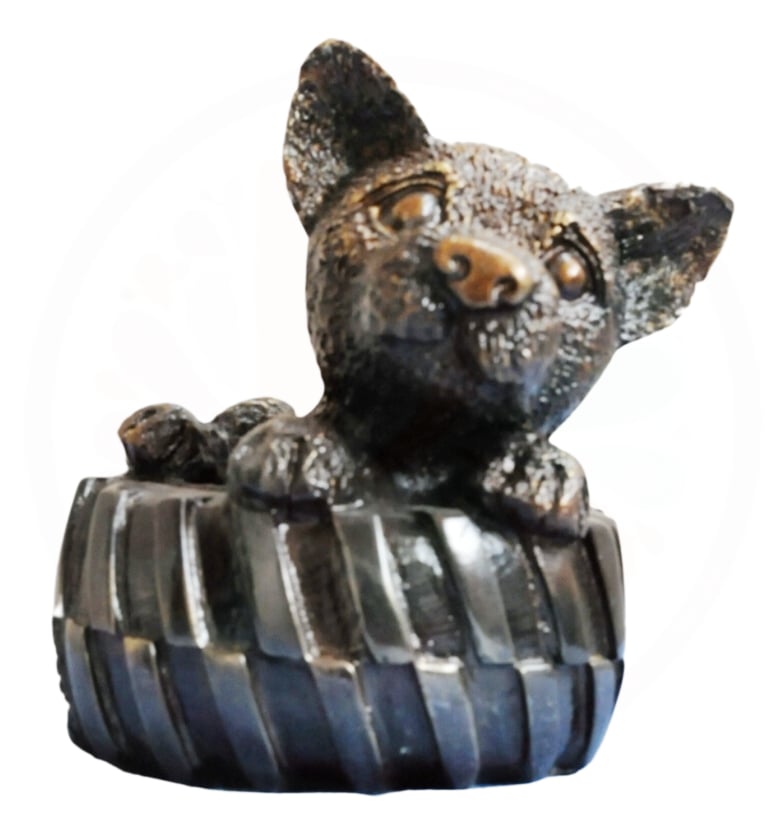 Brass Puppy seated in tyre Statue