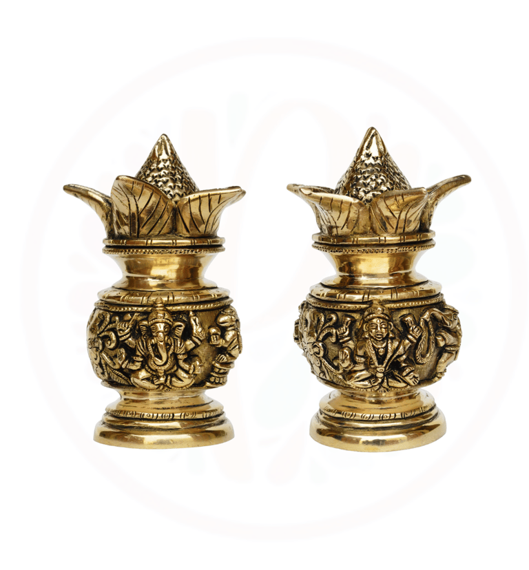 a pair of brass - plated candlesticks