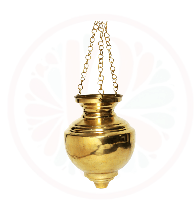 a gold colored vase with a chain hanging from a chain