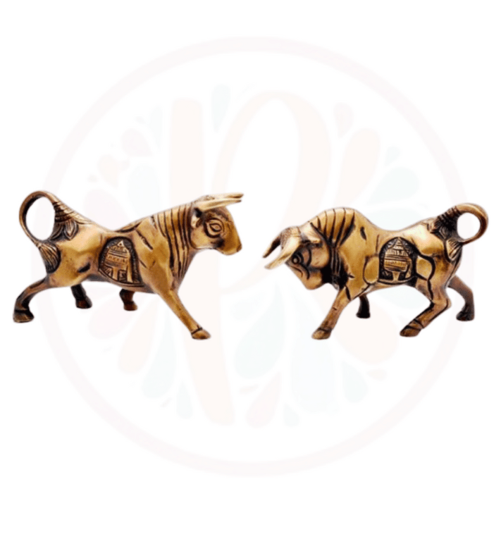 two wooden sculptures of a bull and a tiger
