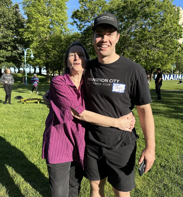 dustin king and his mom hugging in the wellness park 
