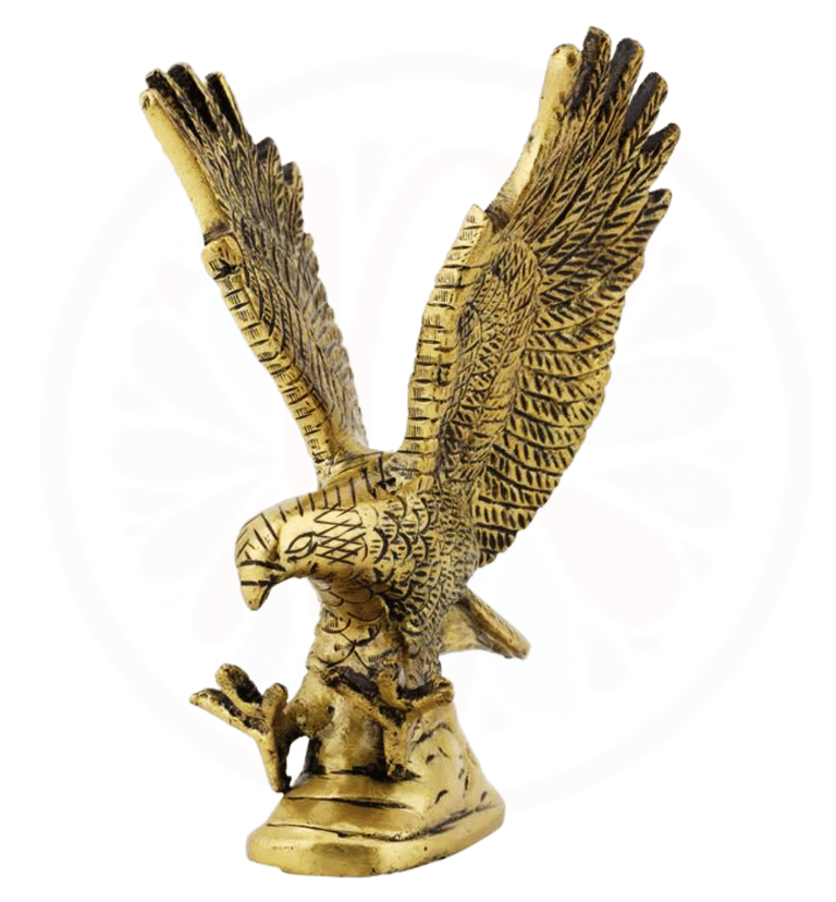 a golden eagle statue of a bird with wings spread out