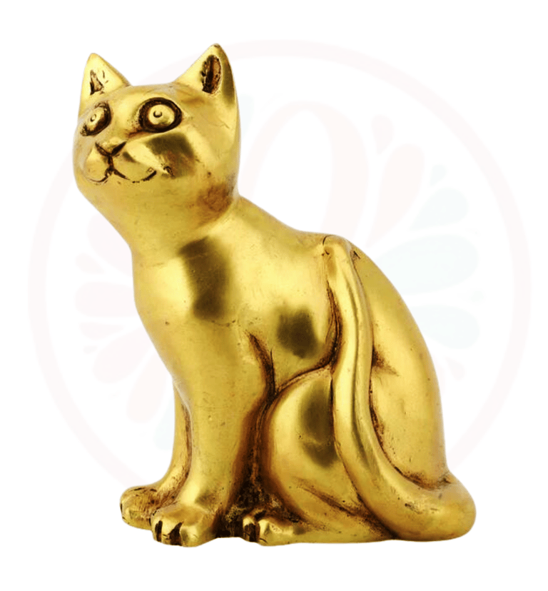 a gold cat statue of a cat