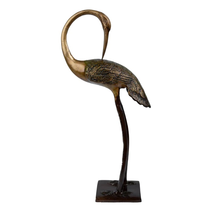a bronze bird brass