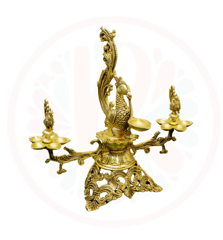 a brass bellows with a peacock on it