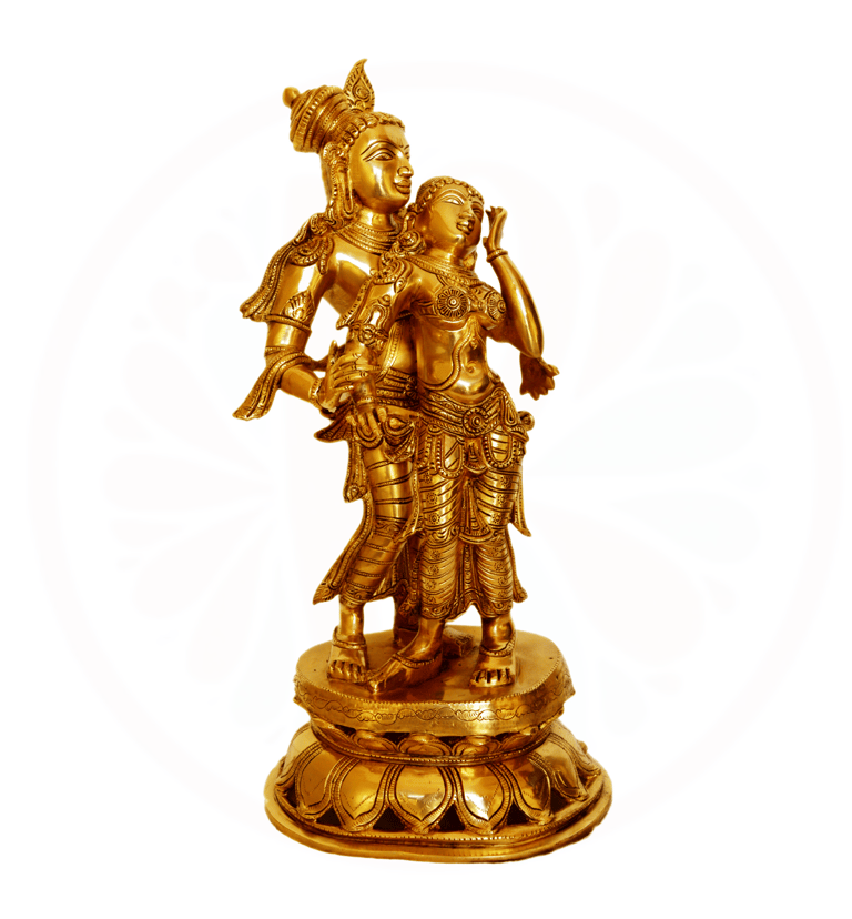 a golden statue of aradha krishna