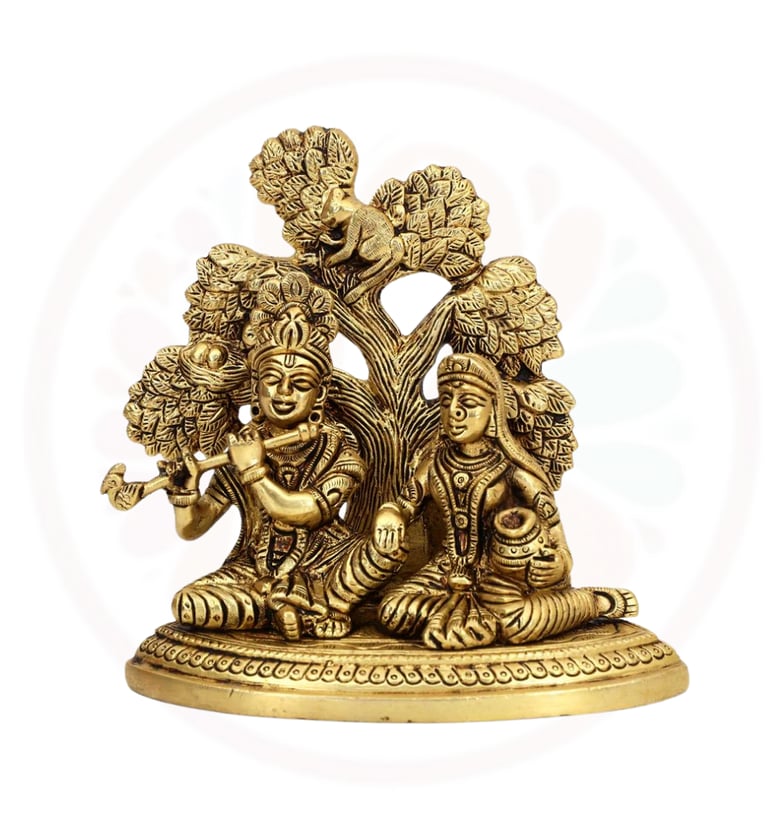 brass radha krishna sitting under the tree
