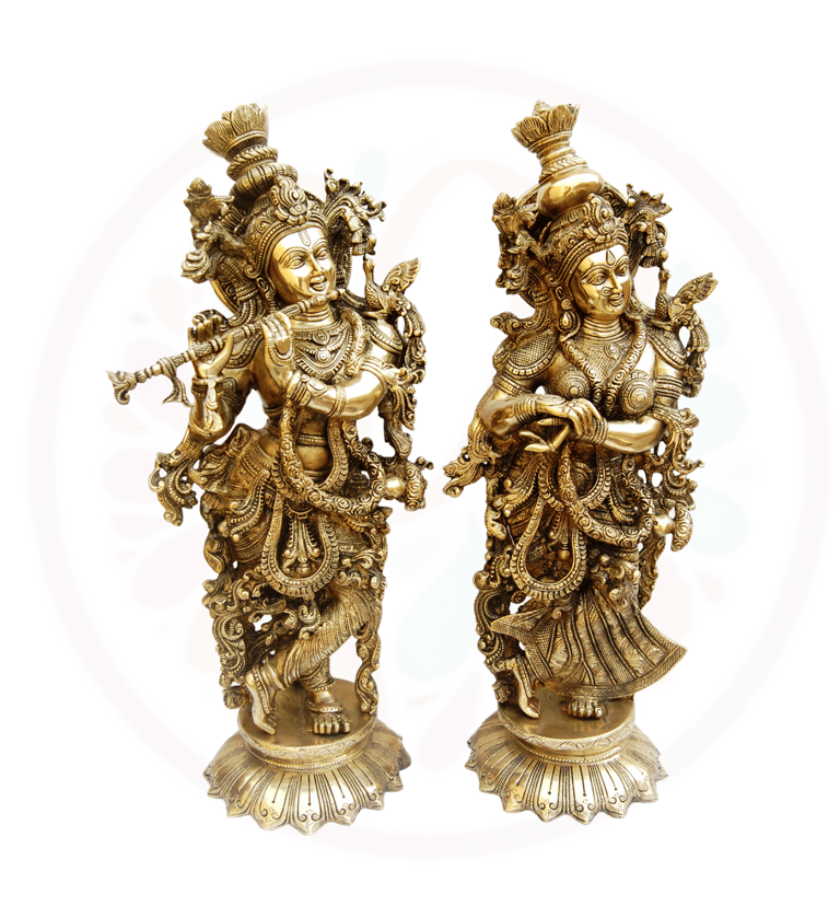 a pair of two statues of hindu deities