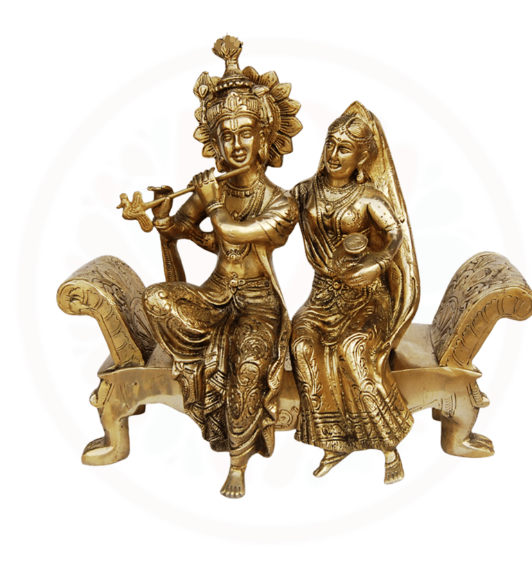 a couple of statues of aradha krishna sit
