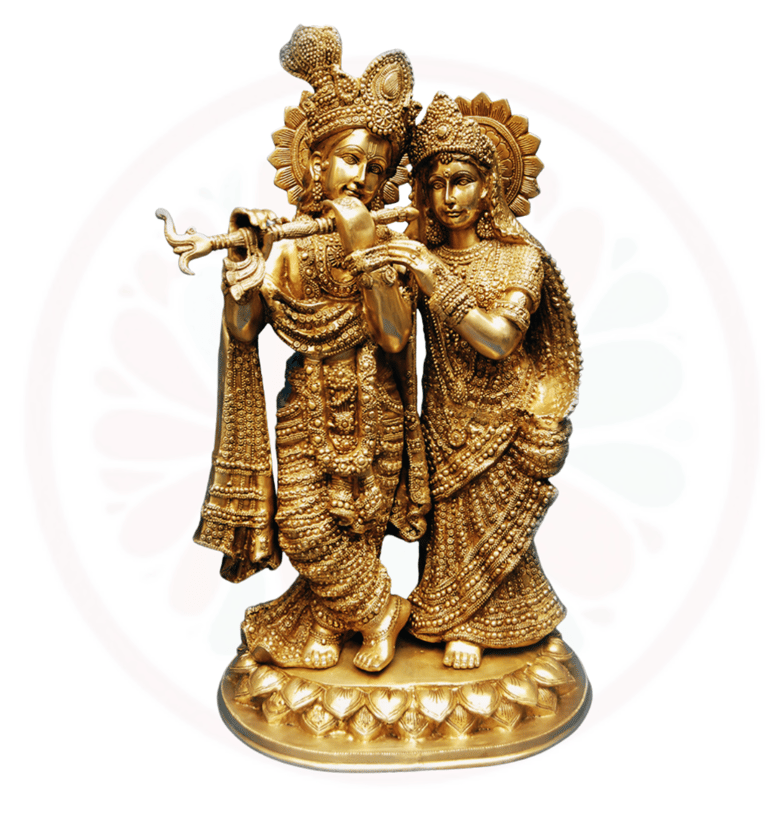 a golden statue of a couple playing flute
