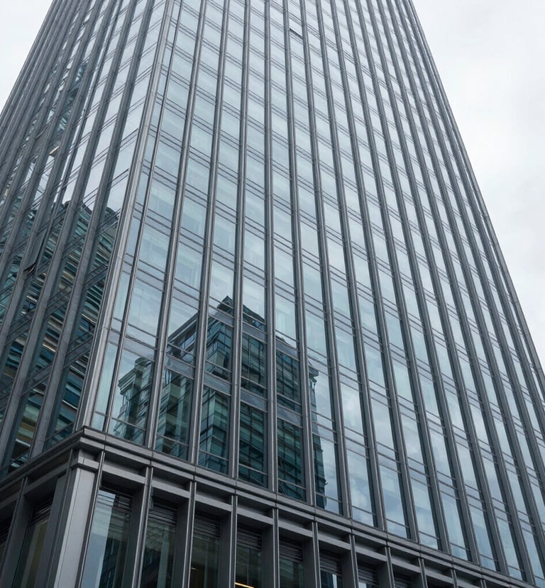 Wide-angle architectural crop of modern glass-and-steel skyscraper facade reflecting cool diffused daylight, sharp focus, 35mm