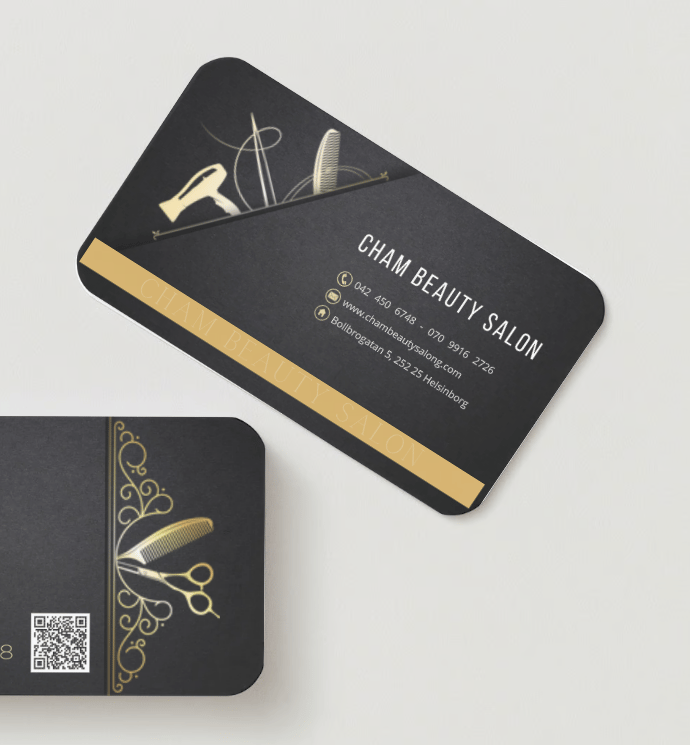 a business card with scissors and scissors on it