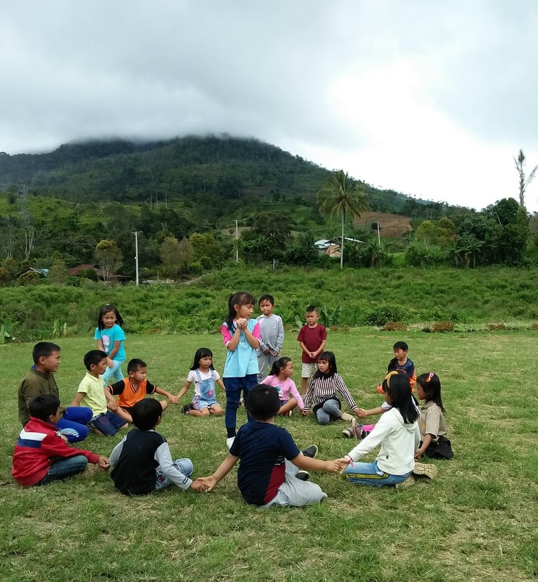 a group of people sitting around a circle of people