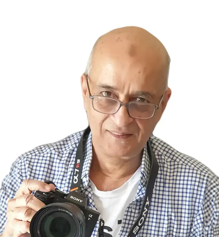 Sohail Photographer - a man with a camera and a camera