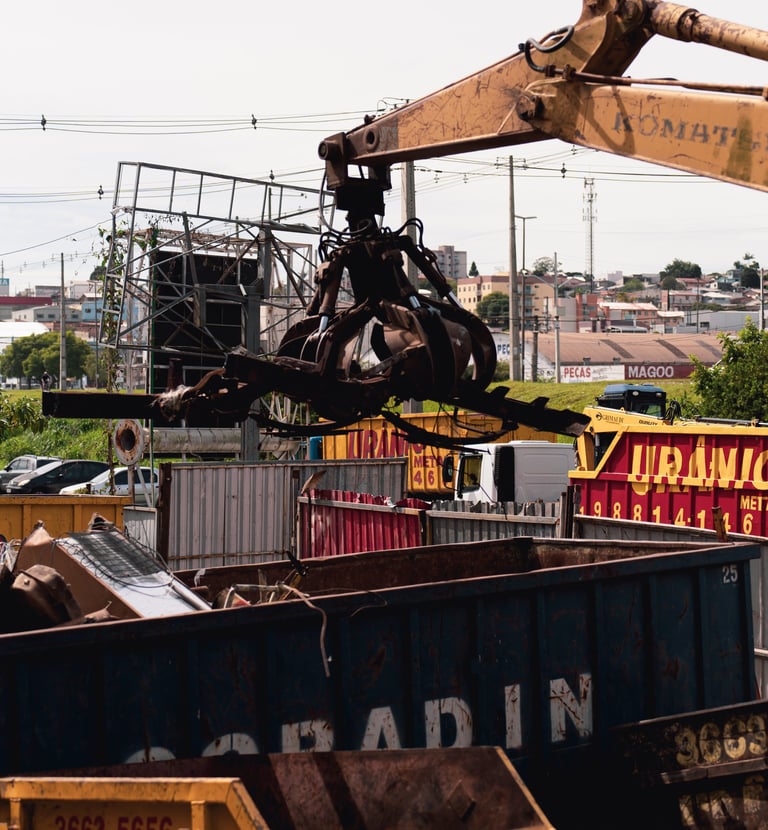 a craned craned over a pile of junk