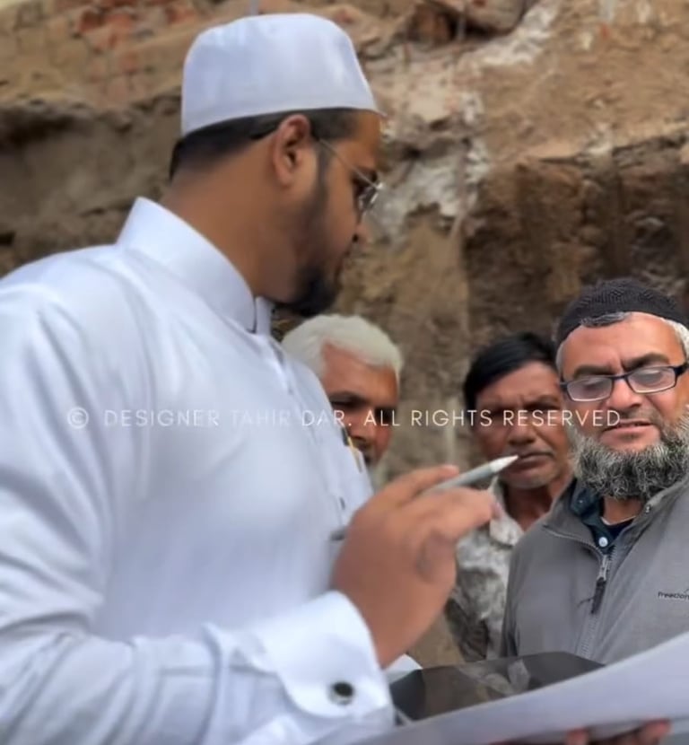 Apartment complex with balconies and lush greenery