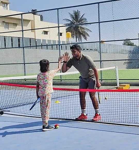 Coach Rohan Working with Red Ball Player