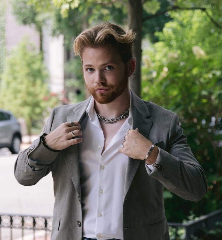 a man in a suit jacket and a white shirt