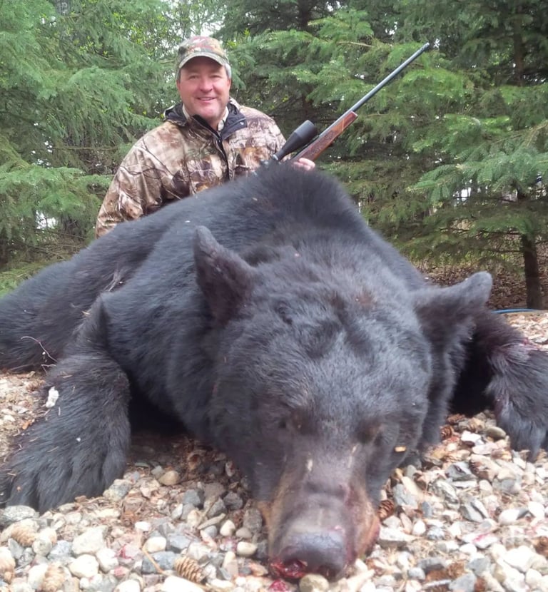 Saskatchewan black bear hunts - hunter with great black bear