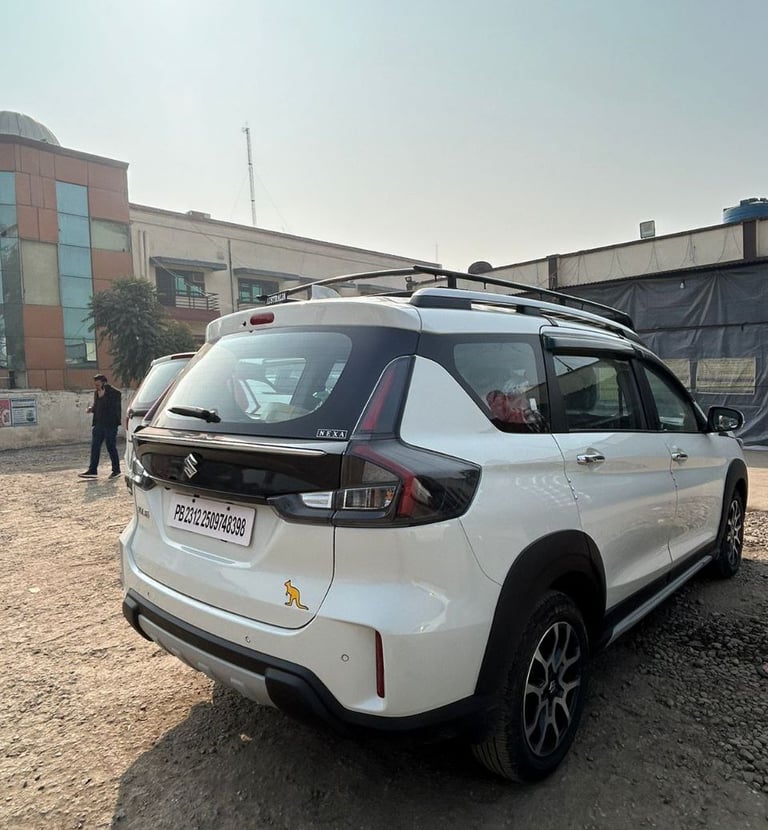 a white suv parked in a parking lot