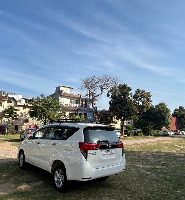 a white van parked in a grassy area