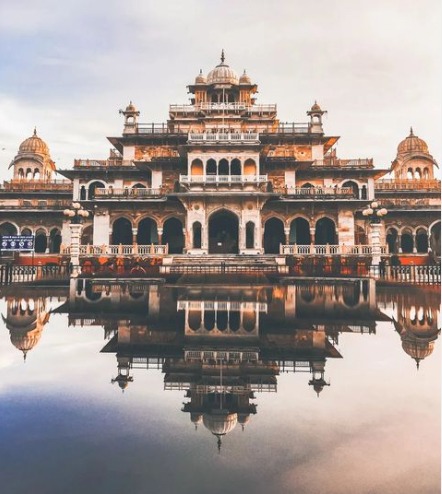 a large building with a large building in the background