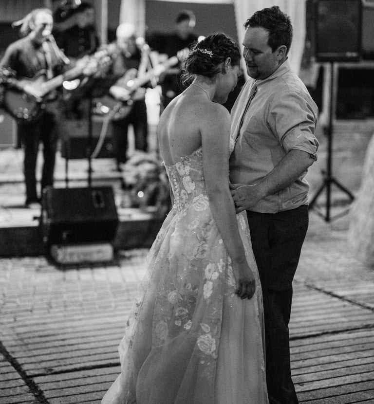 Bride and Groom Slow Dancing to A Live Band