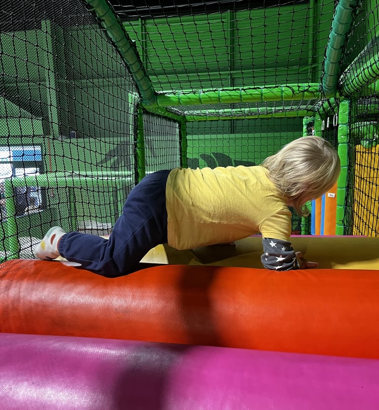 Boy on soft play at Frankie and Lolas