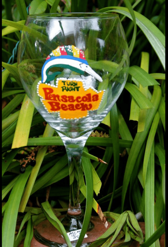 Pensacola Beach sign on wine glass