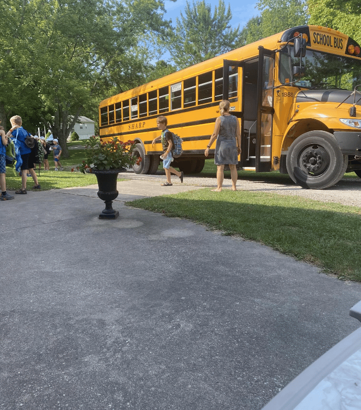 bus delivering kids to camp