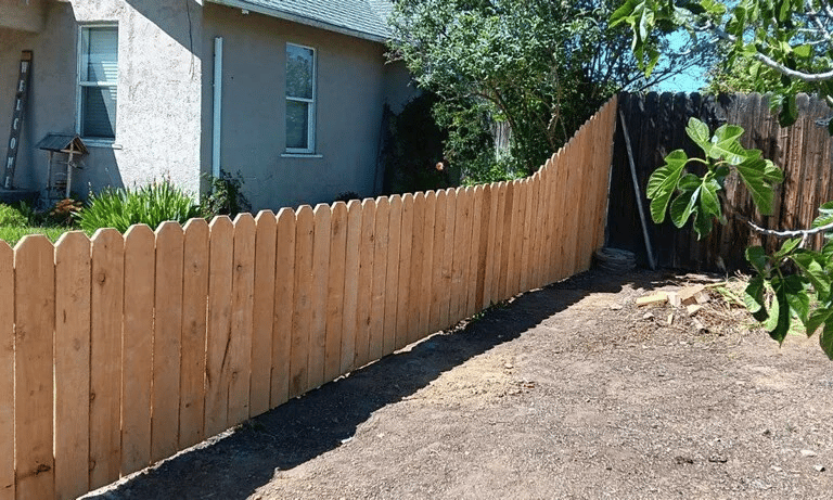 a fenced in yard with a fenced in area