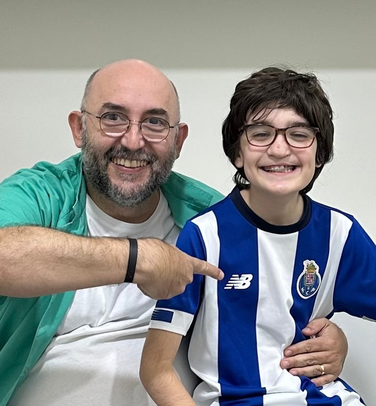 a man and a boy sitting on a couch