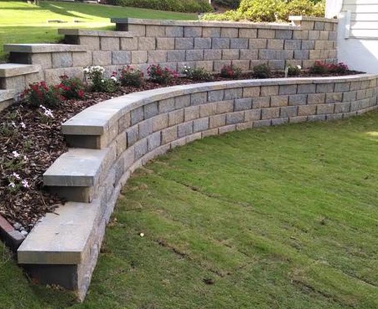 curved retaining wall built by Carrollton Retaining Walls