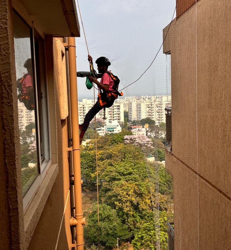 Anti pigeon net installation for flat balcony in Goregaon